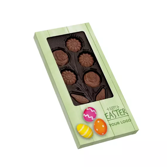 Egy csokor csokivirág egyedi grafikájú papírdobozban